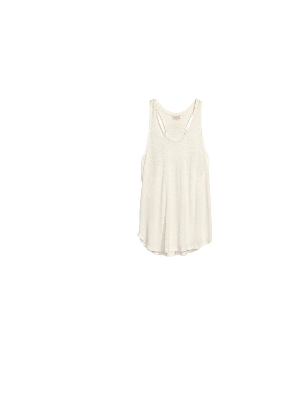 <p>A cami is key to transeasonal layering, <a href="http://www.hm.com/gb/product/17414?article=17414-B">H&amp;M</a> vest, £9.99</p>