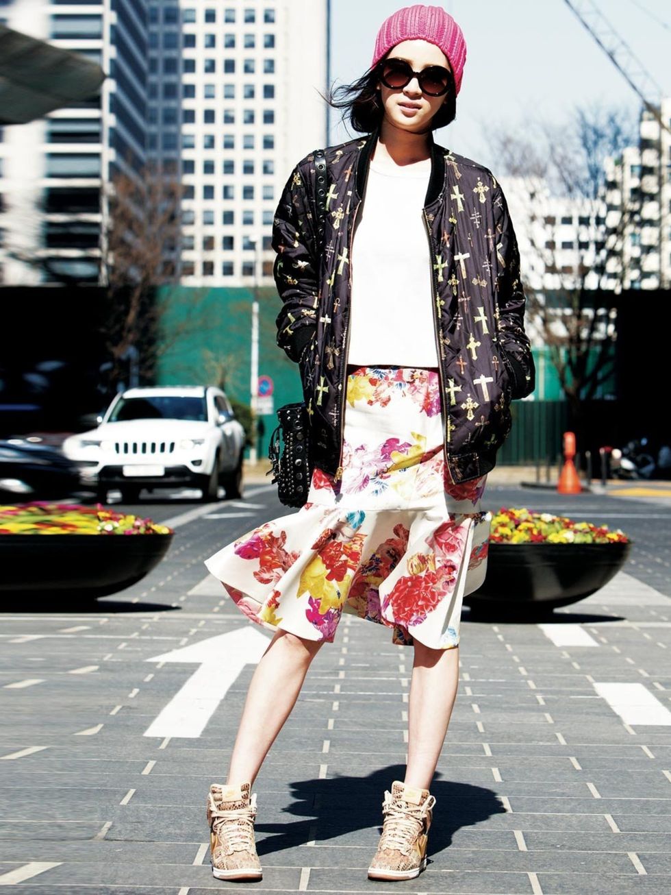 <p>A floral skirt makes this sporty bomber jacket and high-tops look instantly girly, Korea. </p>