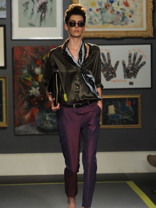 <p>Paul Smith gave his girls 1950s quiffs and rocker attitudes for his spring 2011 show. The look was decidedly mannish - cropped or rolled tailored trousers in everything from light suiting to silk that moved from green to purple. Oversized slouchy shirt