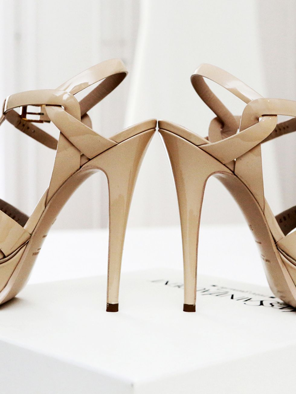 <p>I knew that I didn't want white wedding shoes, and earlier this February, I went with my mother to Madrid for a weekend, where I found these perfect <a href="http://www.ysl.com/gb" target="_blank">Yves Saint Laurent</a> sandals.</p>