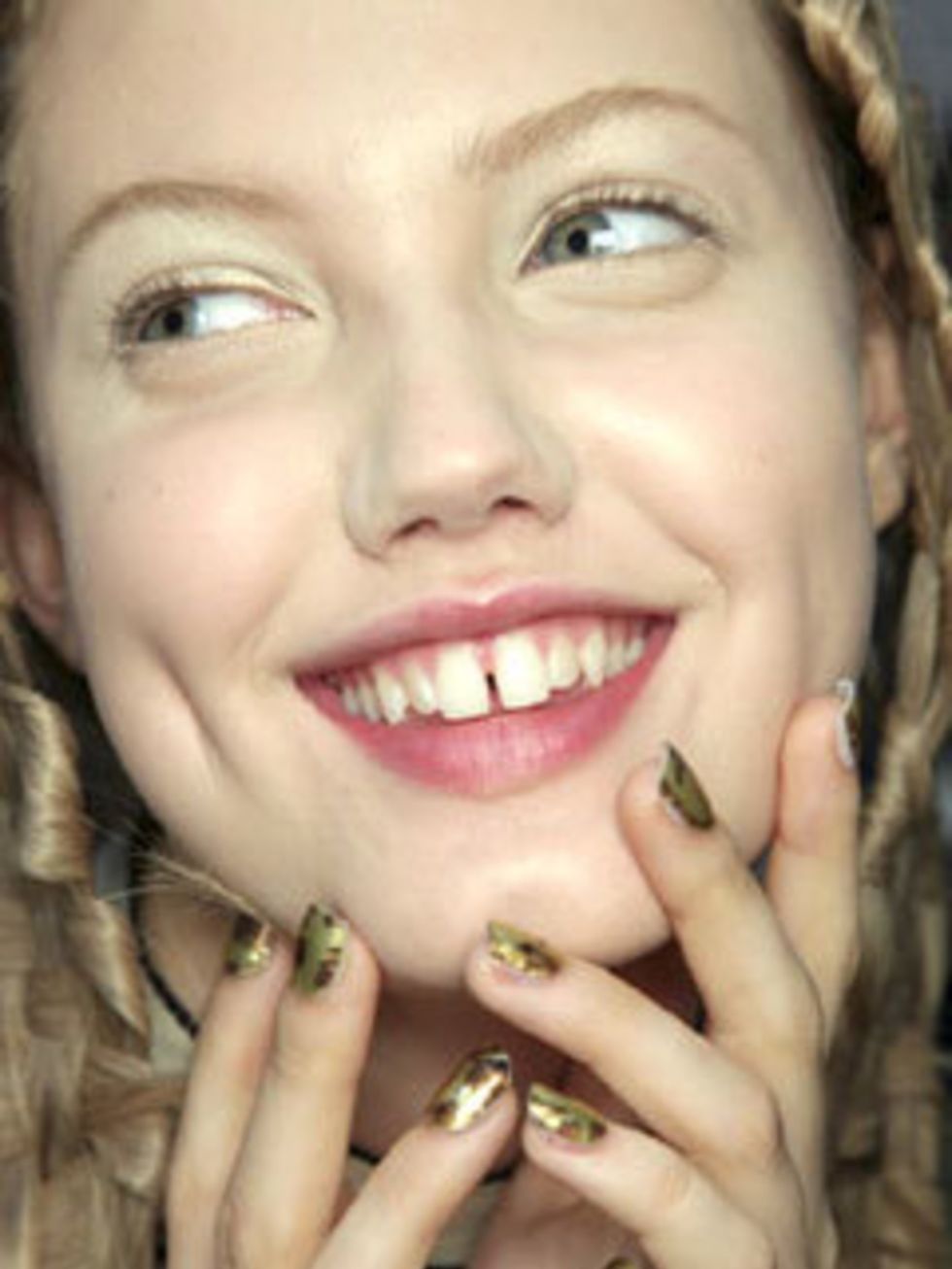 <p>The model of the season, Lindsay popped up everywhere from New York to Paris to show off her very toothy but endearing smile! I loved her here at McQueen SS11 looking both regal and otherworldly at the same time. </p>