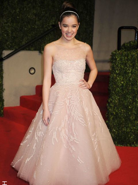 <p>Hailee Steinfeld arriving on the ruby rug at the Vanity Fair Oscar Party wearing a ballet pink tulle tea length <a href="http://www.elleuk.com/catwalk/collections/marchesa/spring-summer-2011">Marchesa</a> dress, February 2011.</p>