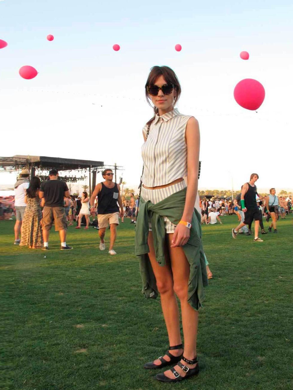 <p><a href="http://www.elleuk.com/star-style/celebrity-style-files/alexa-chung-s-style-file">Alexa Chung</a> wears a Philosophy dress and Karen Walker sunglasses to Coachella 2013.</p>