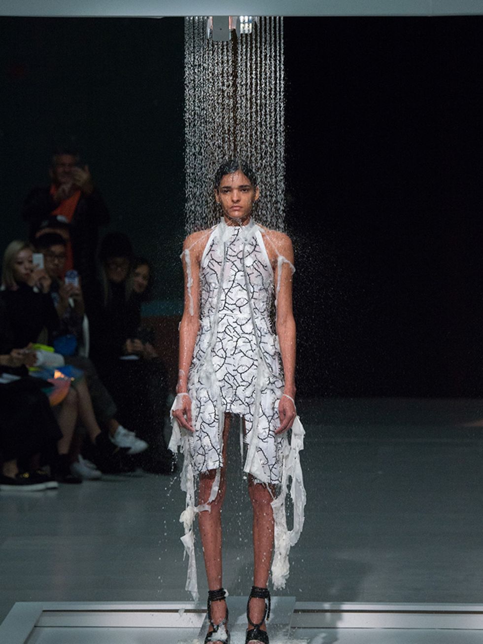 <p>Paper dress + power shower = insta sensation. That's one way to celebrate the Hussein Chalayan's 21st year.</p>