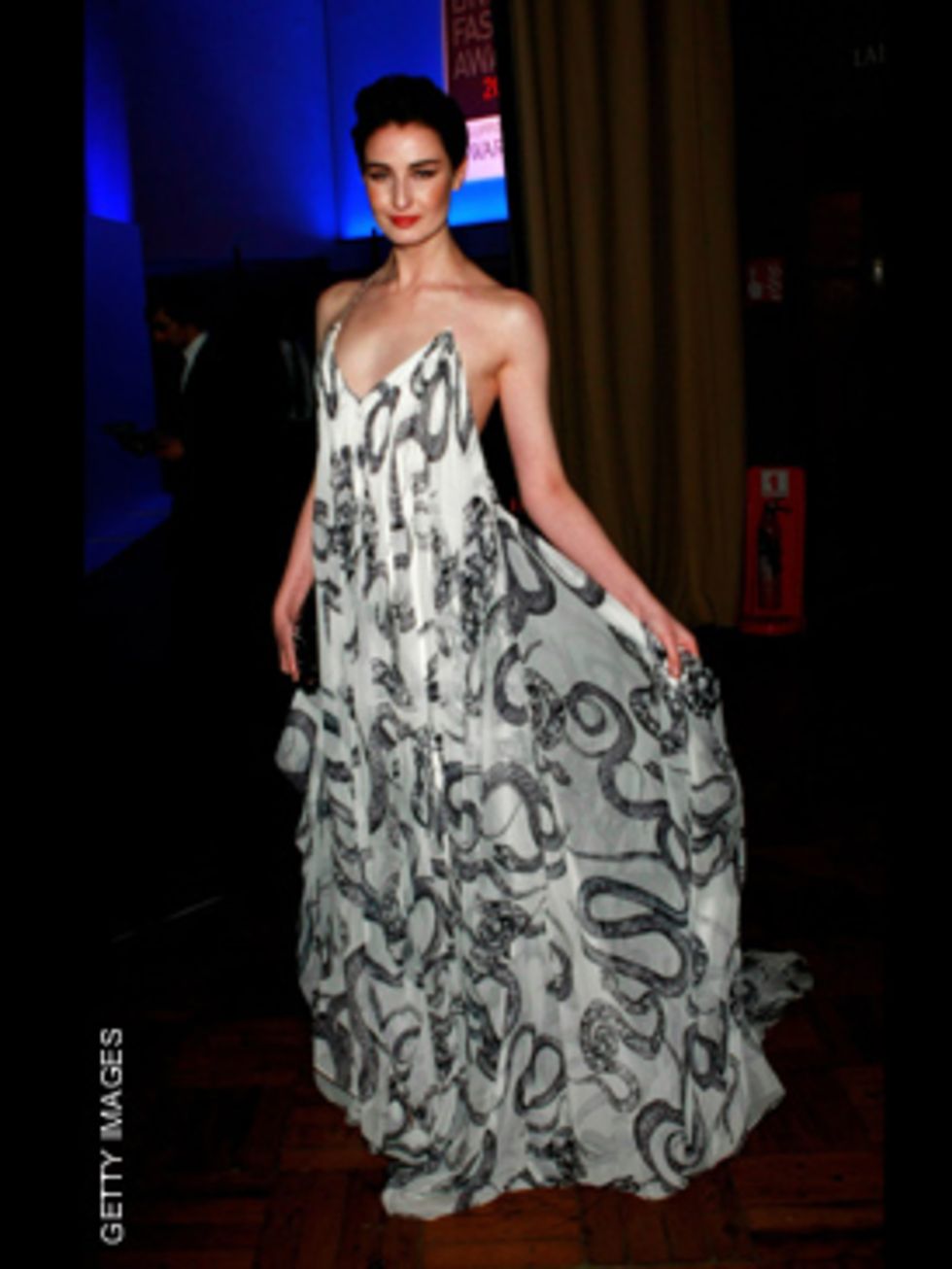 <p>In a show stopping Marchesa dress</p>