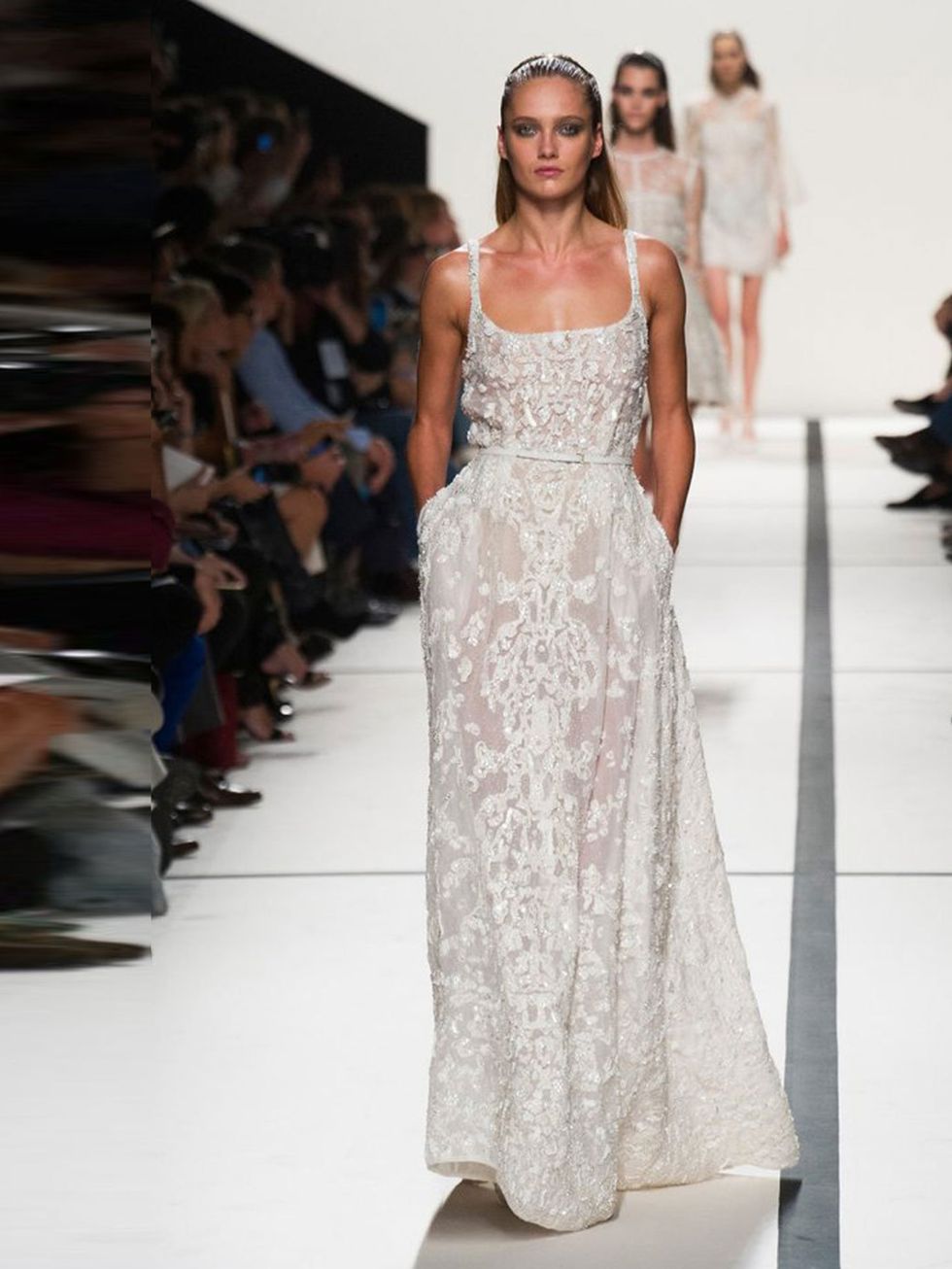 <p><a href="http://www.elleuk.com/catwalk/designer-a-z/elie-saab/spring-summer-2014/collection">Elie Saab</a>, Spring/ Summer 2014.</p><p>Ornate embroidery combined with ultra-flattering shimmer and a characteristically Saab use of transparency, ready to 