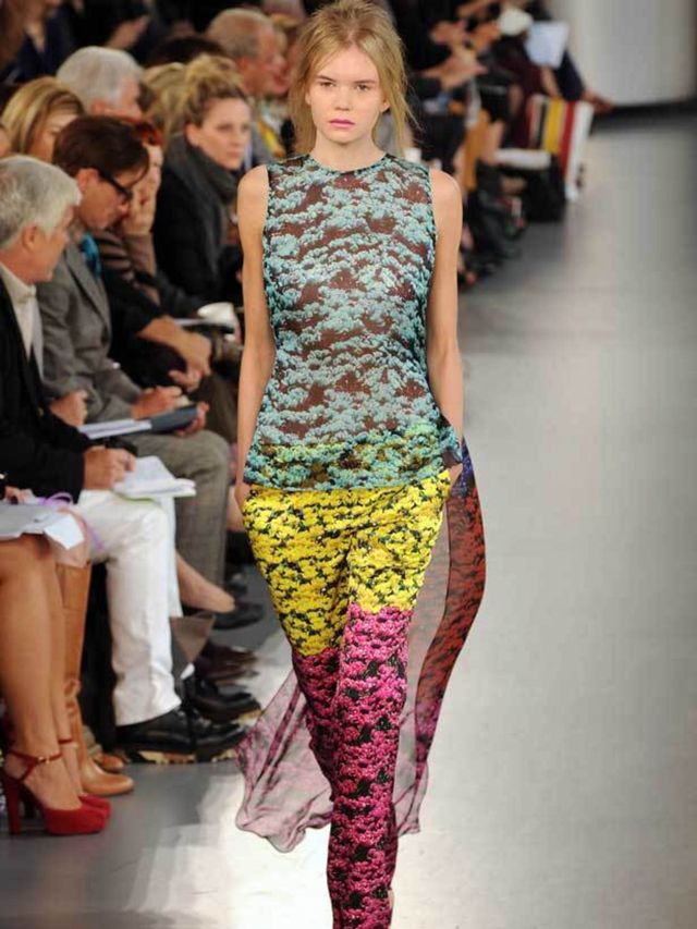 <p><strong>A catwalk tightly packed with a rainbow wash of carnations spoke of a change in print path for Mary Katrantzou. From trompe l'oeil to the battle of the garden of Eden versus industrial forms. </strong></p><p>In the left corner, an image of scra