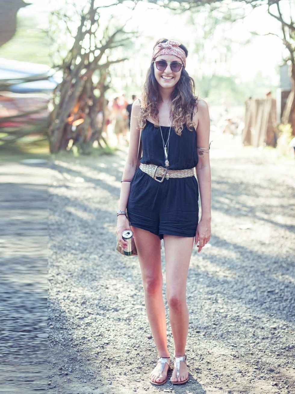 <p>Daisy McLeod wears Topshop playsuit, Next sandals, Mink Pink sunglasses, Topshop necklace, Great grandmother's headscarf and bag with vintage belt.</p>
