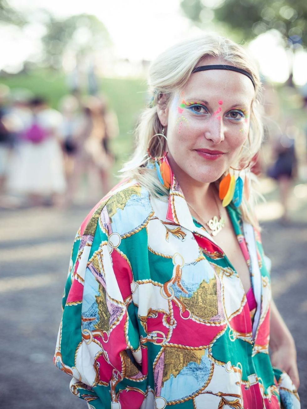 <p>Amelia Sweetlands is wearing a vintage shirt from Kate and Aud and Portobello Road earrings.</p>