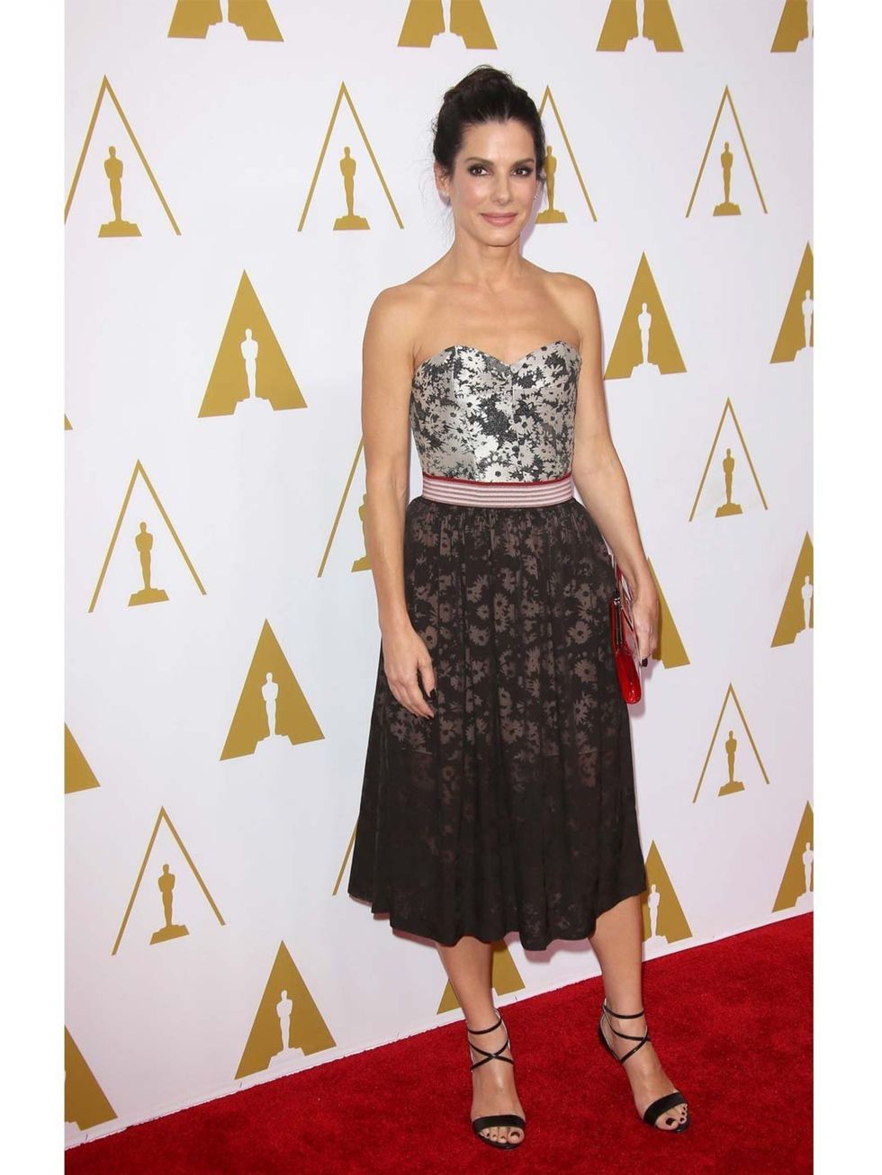 <p><a href="http://www.elleuk.com/star-style/celebrity-style-files/sandra-bullock-celebrity-red-carpet-gravity-victoria-beckham-stella-mccartney-jenny-packham">Sandra Bullock</a> wears Stella McCartney to the 86th Annual Academy Awards Nominee Luncheon.</