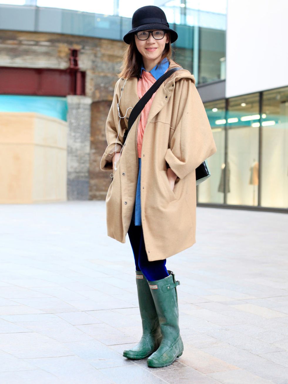 <p>Riqi, 23, Urban Outfitters hat, Cheap Monday coat, Cos top, Hunter wellies.</p><p>Photo by Silvia Olsen @ Anthea Simm</p>