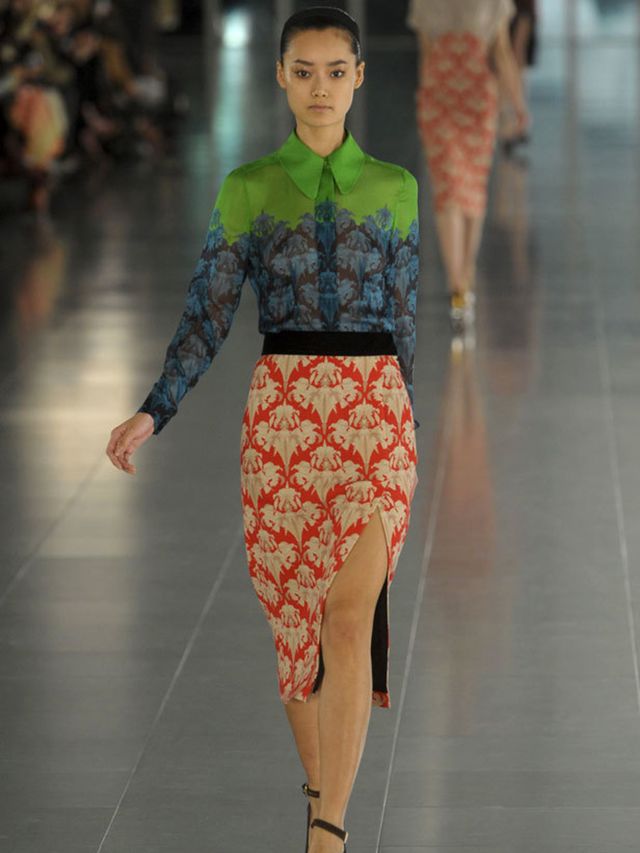 <p>Saunders moved on his vision of ultimate femininity with 40s knee-length pencil dresses in fabric containing print and block colour that almost tricks the eye in to thinking it's a two-piece. There were none of the frivolous flirty shapes from SS11, th