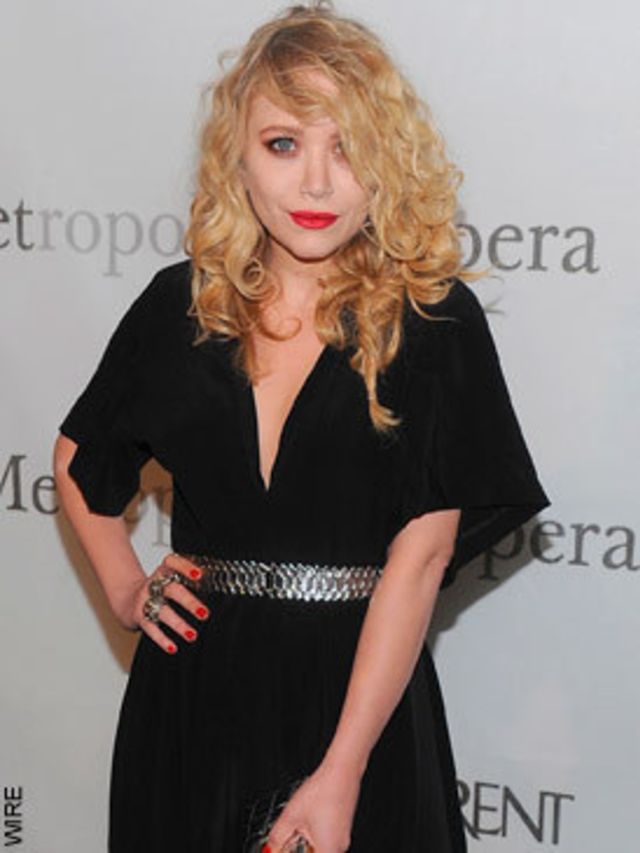 <p>Gone is the unwashed hair and chipped nail polish and, in its place, beautifully tousled curls, bright red lips and slightly smoky eyes. We suspect she's been taking her style cues from eighties <a href="">Madonna</a> and <a href="http://www.elleuk.com
