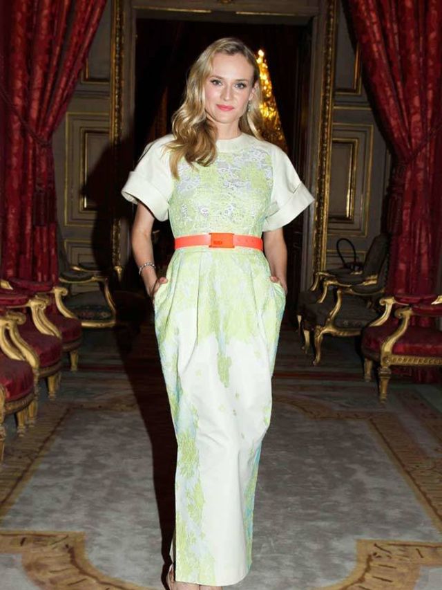 <p>The actress wore Alessandra Richs cream cotton/silk shantung gown with chartreuse lace appliqué and bright orange neoprene belt to the Liaisons au Louvre fundraiser. </p><p>She was one of about 350 attendees who took in a high-energy set by Janet Jack