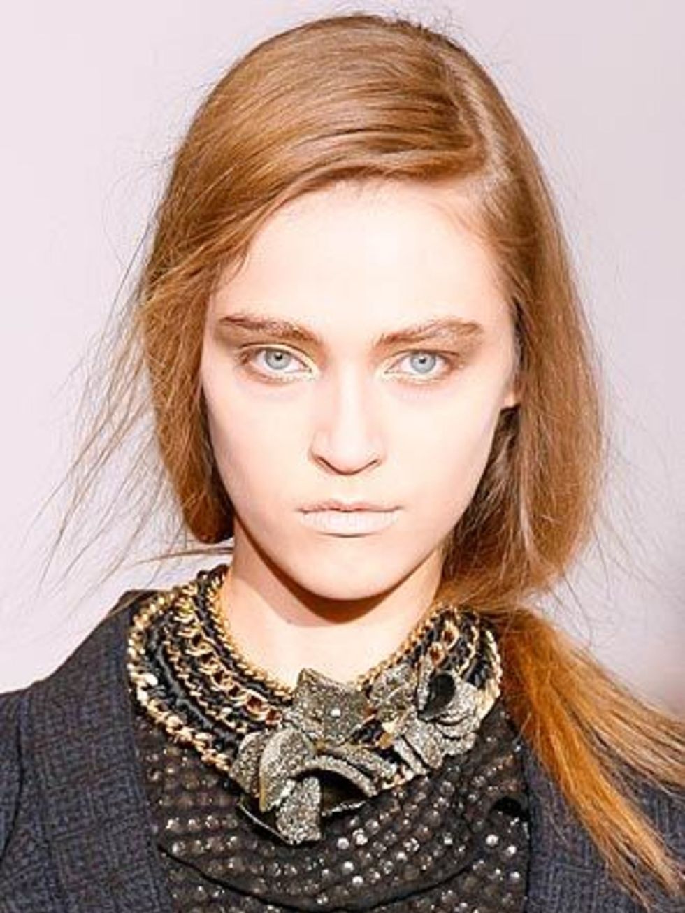 <p>Jewel Eyes</p><p>Gemstones and precious metals inspired a host of different looks backstage this season. At Costume National CNC make-up artist Sally Branka injected elegance into a punky club kid look with wet-look sapphire eyes, while at Prada an a
