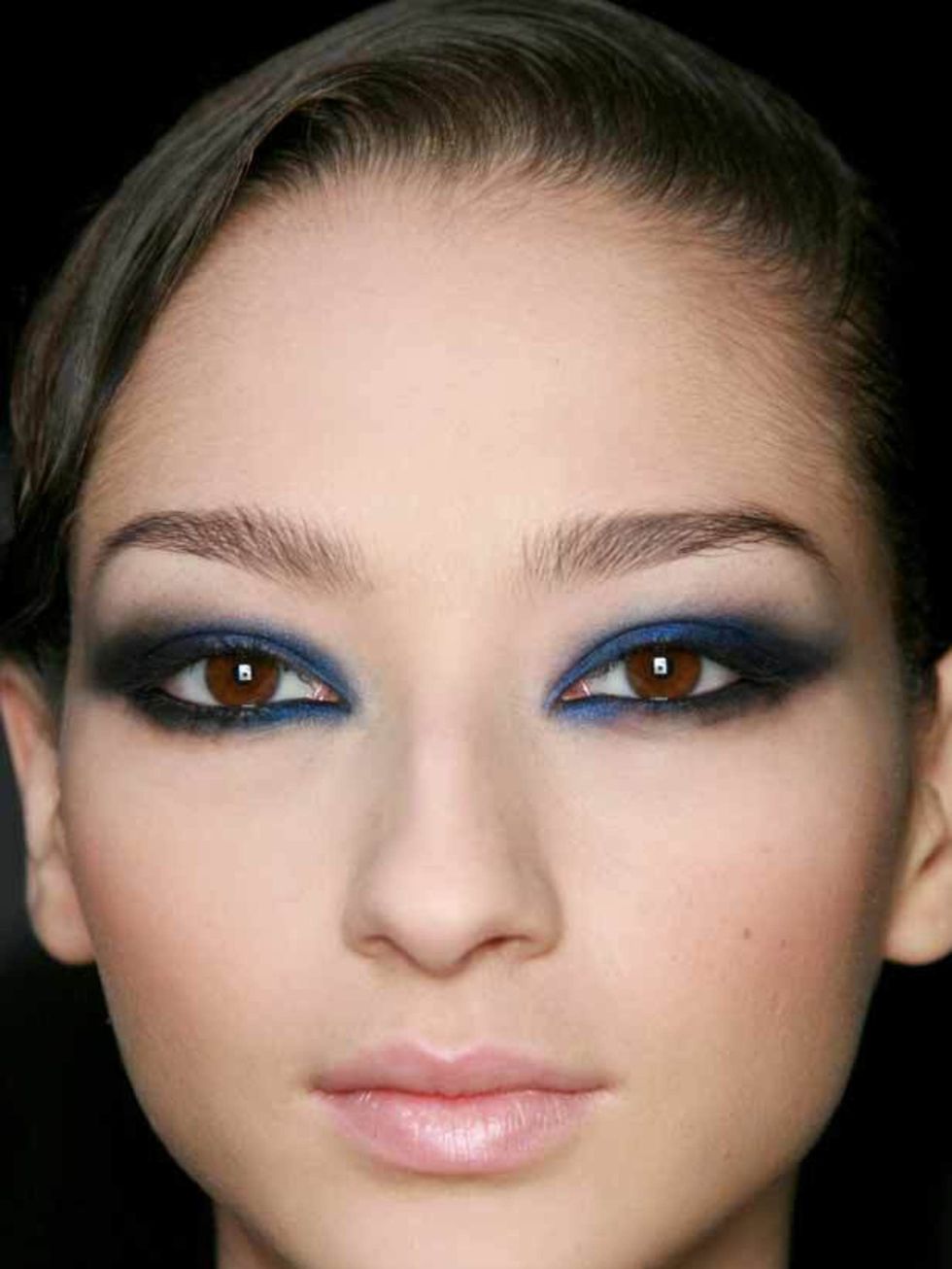 <p>For a subtler way to wear colour this winter, Uzo, Nars' international Senior Make-up Artist recommends the following: 'layer a bold shade such as a bright blue with navy or purple with brown. Start with the bold shade and dust over with the subtler co