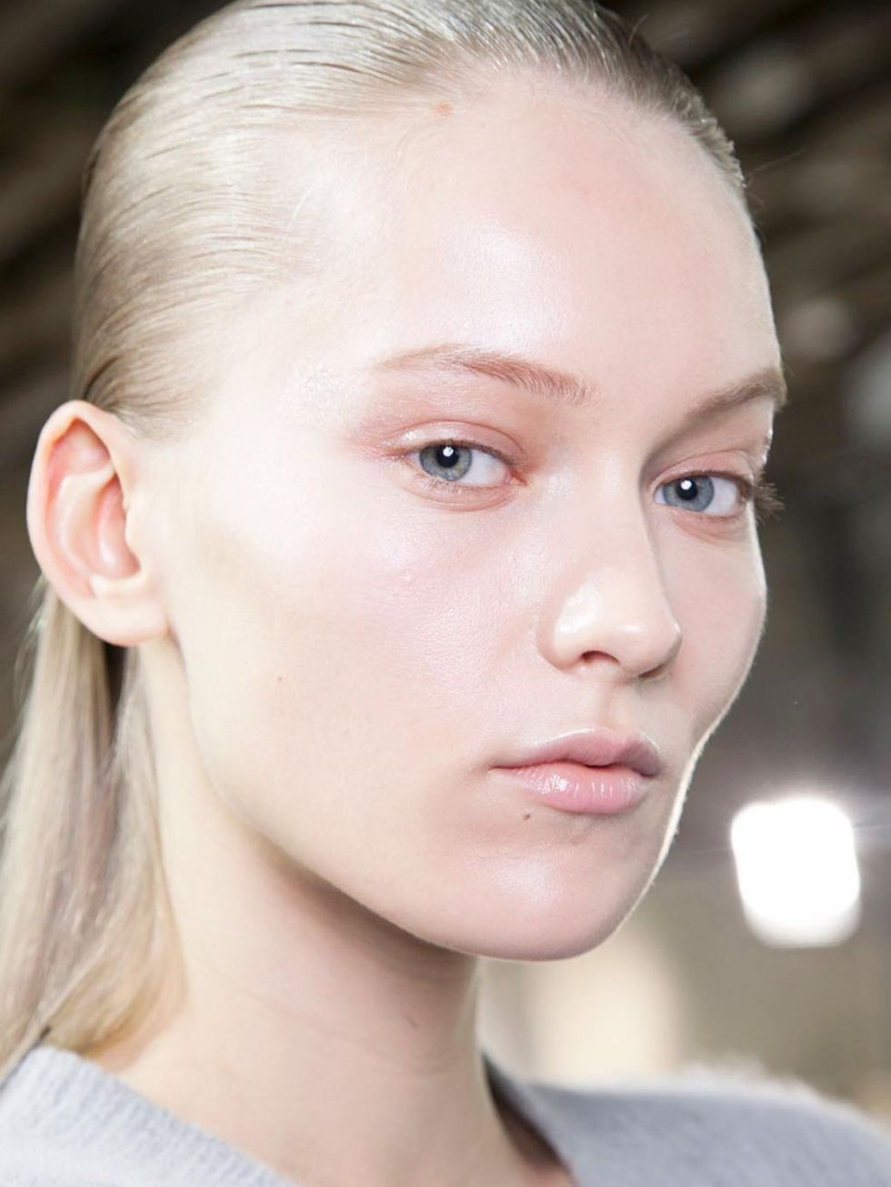 <p>Make-up artist Val Garland was inspired by women today when she created this barely-there, yet beautiful make-up look. At the corner of each eye Garland used a flat, square brush to paint on a graphic slick of pearlescent, translucent shimmer that caug