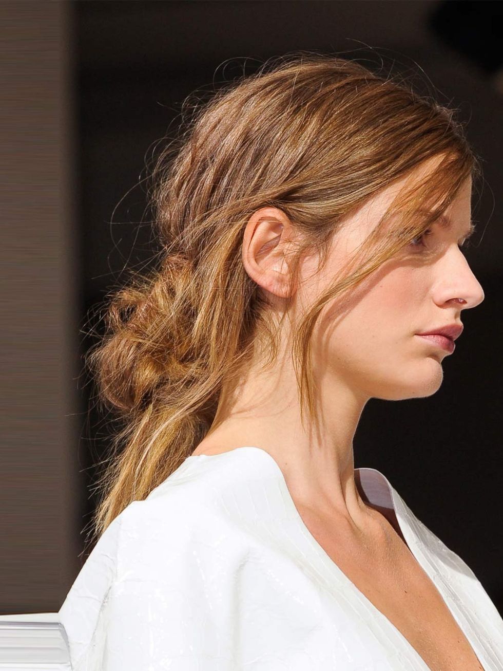 <p><strong>Hair by:</strong> Paul Hanlon for Tigi</p><p>A favourite with Lorraine, this mussed-up, knotted ponytail was 'inspired by the girls in the <a href="http://www.elleuk.com/catwalk/designer-a-z/marni/spring-summer-2013">Marni</a> office', revealed