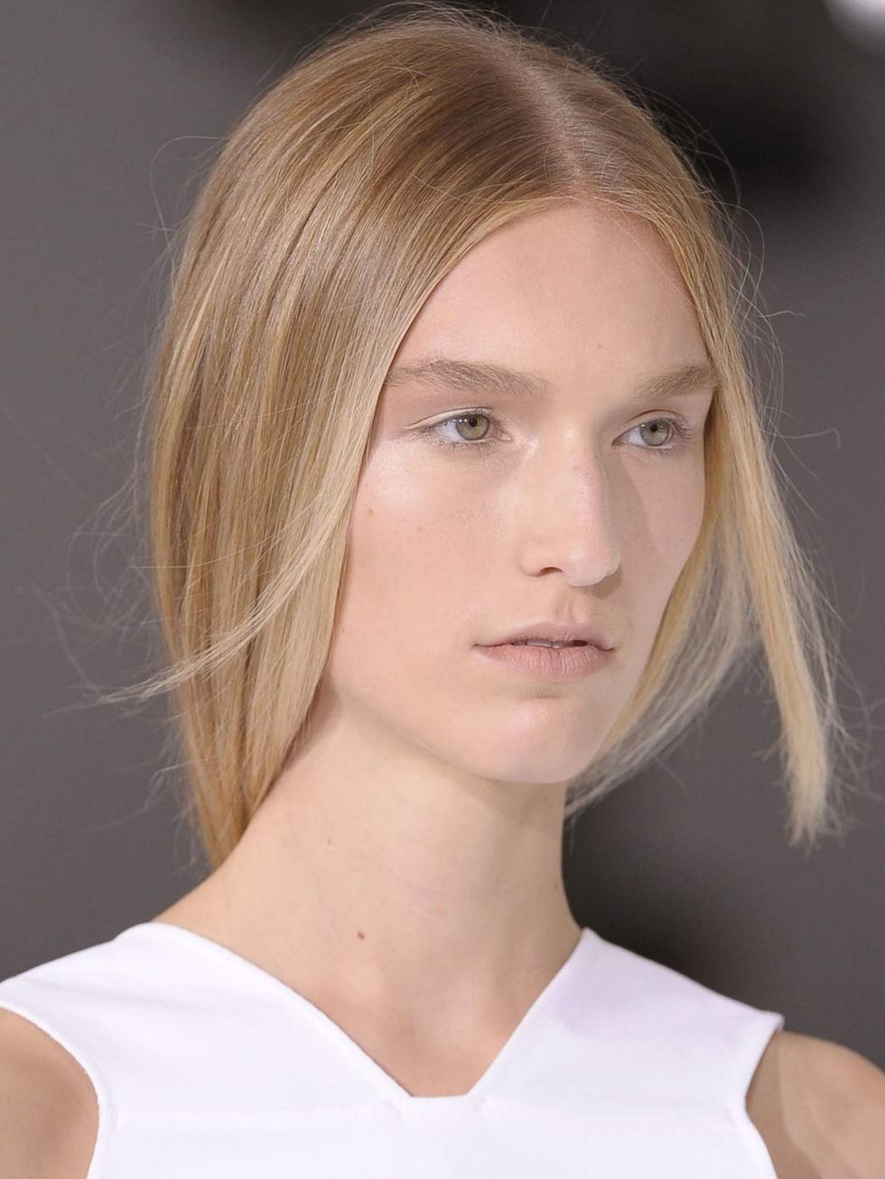 <p><strong>Hair by:</strong> Guido for Redken</p><p>Forget the irons for this <a href="http://www.elleuk.com/catwalk/designer-a-z/jil-sander/spring-summer-2013">Jil Sander</a> look, blow-dry your hair straight. Then rub a little Redken Glass Look 01, £17.
