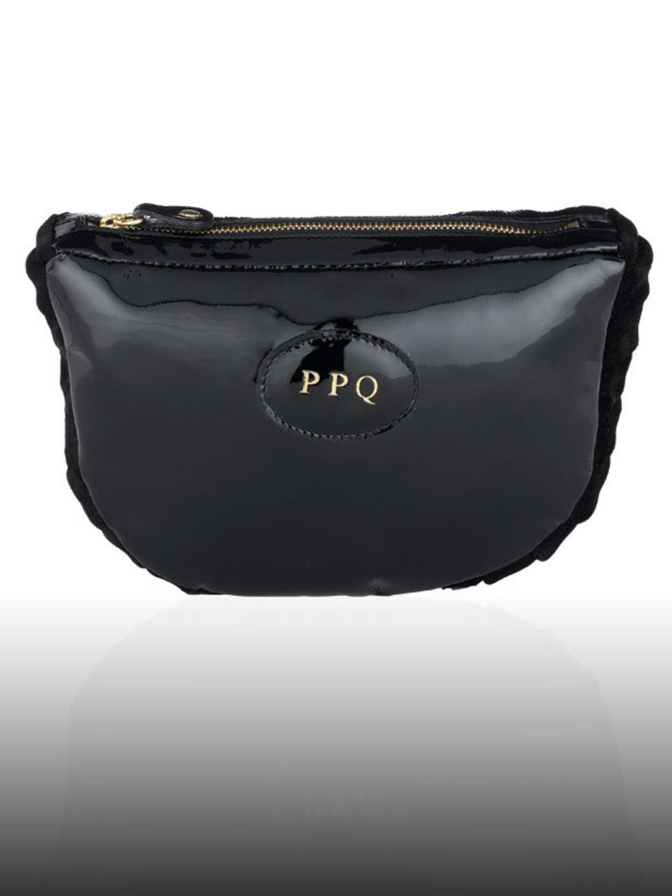 <p>Fallon make-up bag, £175 by PPQ. For the stockist call 0207 494 9789.</p><p>Kimberly was front row at the PPQ A/W 08 show in London and found this fabulous make-up bag among the goodies she received from the designers and has been using it ever since.<