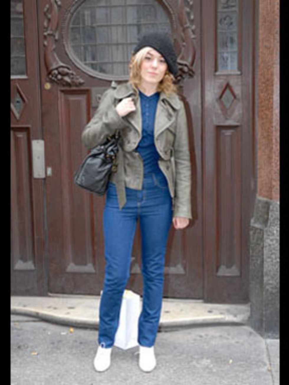 <p>Caroline is rocking a quirky yet chic style. The key to her fabulous look? Combining designer pieces such as her simple Vanessa Bruno T-shirt with high end high street items. Her fabulous leather jacket is from All Saints. She makes a real statement by