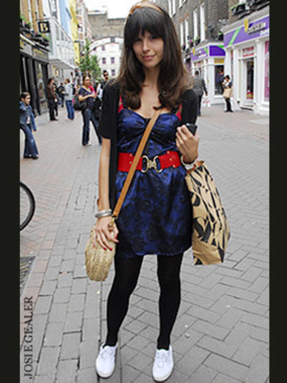 <p>If the sun's not shining then remember that layering is key when sporting your favourite frock. Esme has paired her gorgeous electric blue dress with tights and a cropped jacket , while her bold red belt and straw bag give her look a summery lift.</p>