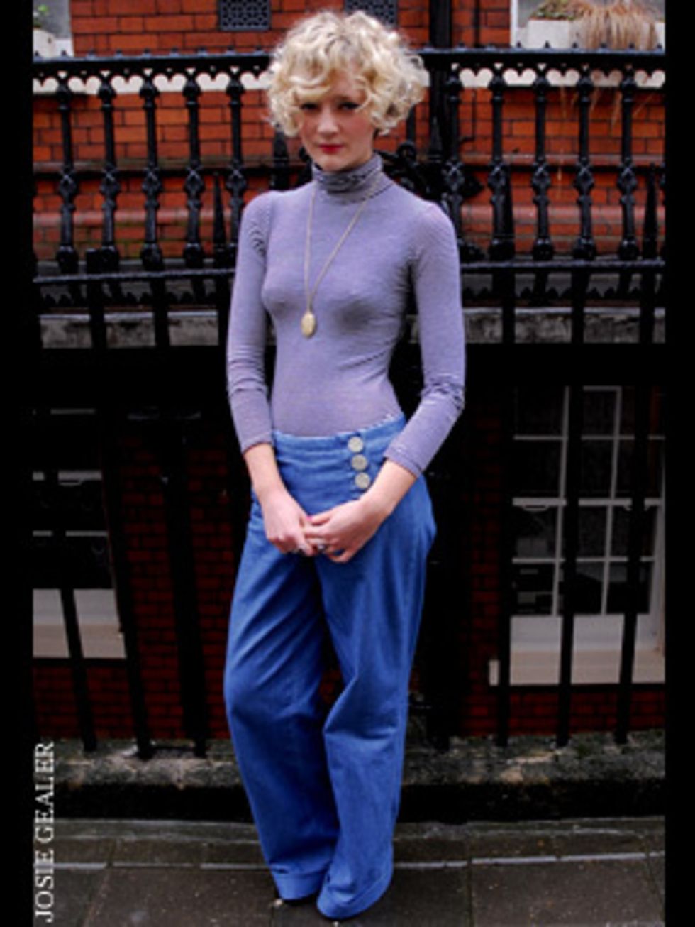<p>Hattie looks ship-shape in her version of the nautical look. Sporting the jeans shape of the season, high waisted and wide legged, she's chosen a sailor style front with big buttons. We love her finely striped polo-neck too, tucked into jeans for a str