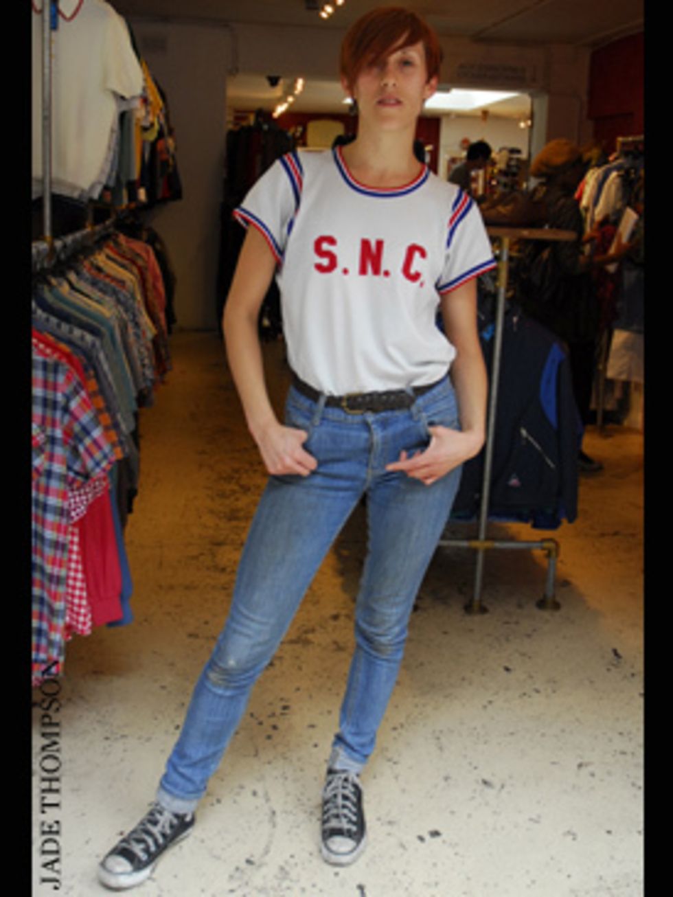 <p>Rose is effortlessly cool - tucking her boyinsh vintage sports T-shirt into high-waisted skinny jeans. Note: rolled hems are the only way to wear your jeans this summer.</p>
