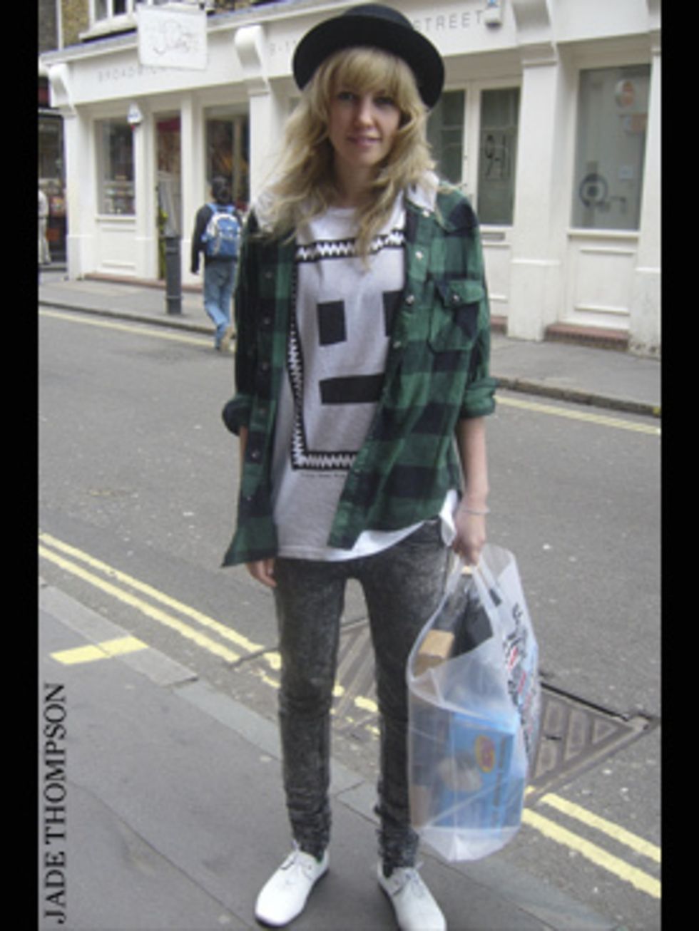 <p>Pip wears her nu-rave baggy tee with stone-washed skinny jeans and a black bowler for a full on 1980s club kid look.</p>