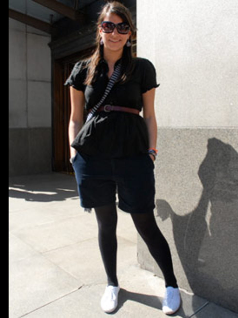 <p>Preppy tailored shorts are fast becoming a summer classic. Lauren has paired hers with a cotton blouse and plimsols and uses her skinny tan belt to nip in her waist creating an instantly more flattering silhouette.</p>