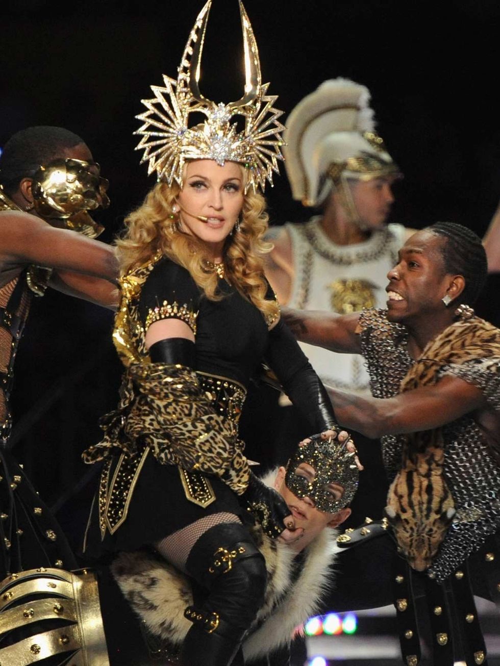 <p>Madonna wore a custom-made Philip Treacy headdress and Givenchy couture for her performance.</p>