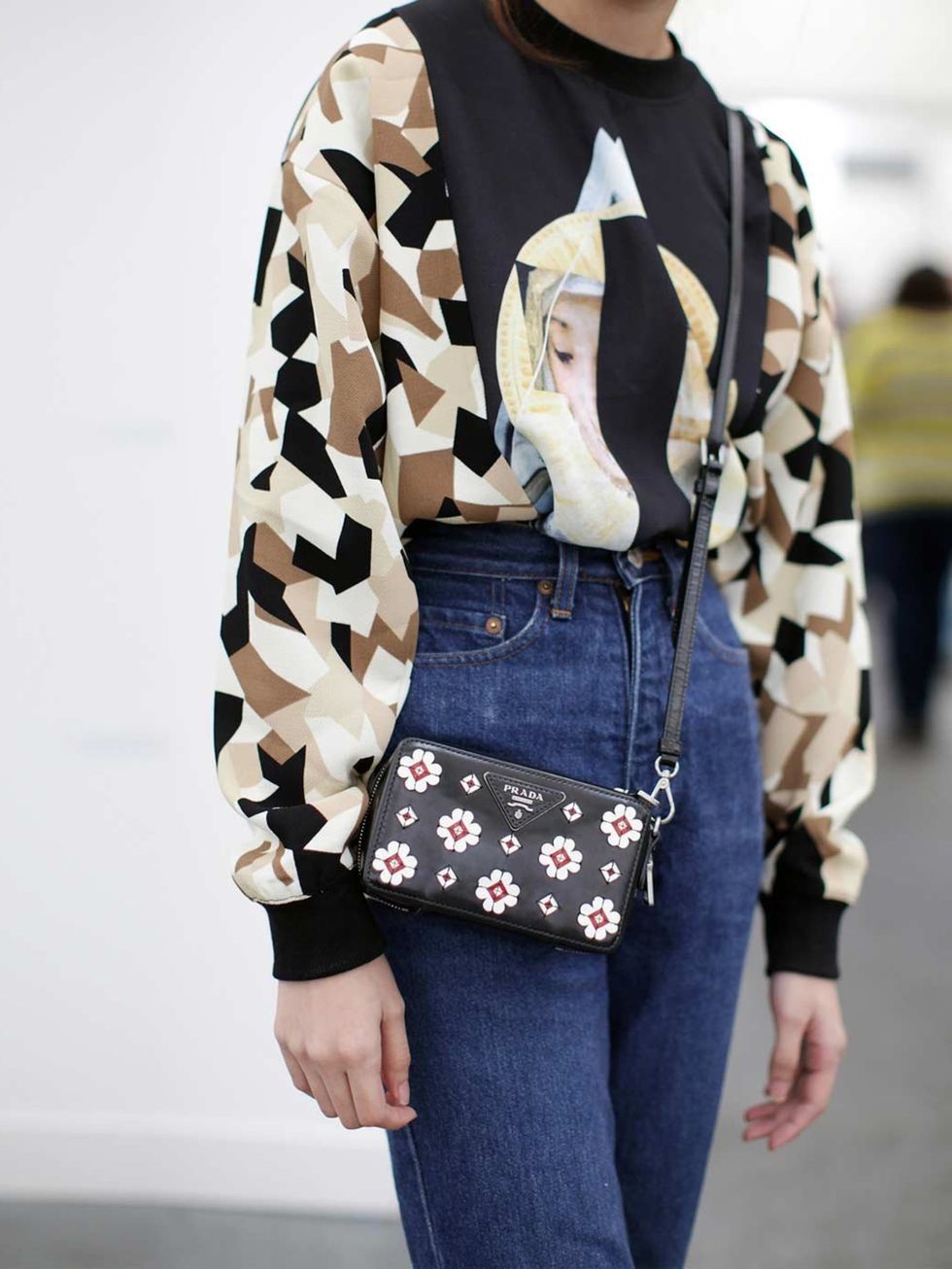 <p>top from a boutique in Thailand; Vintage jeans, Prada bag </p><p><em><a href="http://www.elleuk.com/star-style/red-carpet/frieze-art-london-2013-kate-moss-tracey-emin">See the stars at Frieze</a></em></p><p><em><a href="http://www.elleuk.com/style/stre