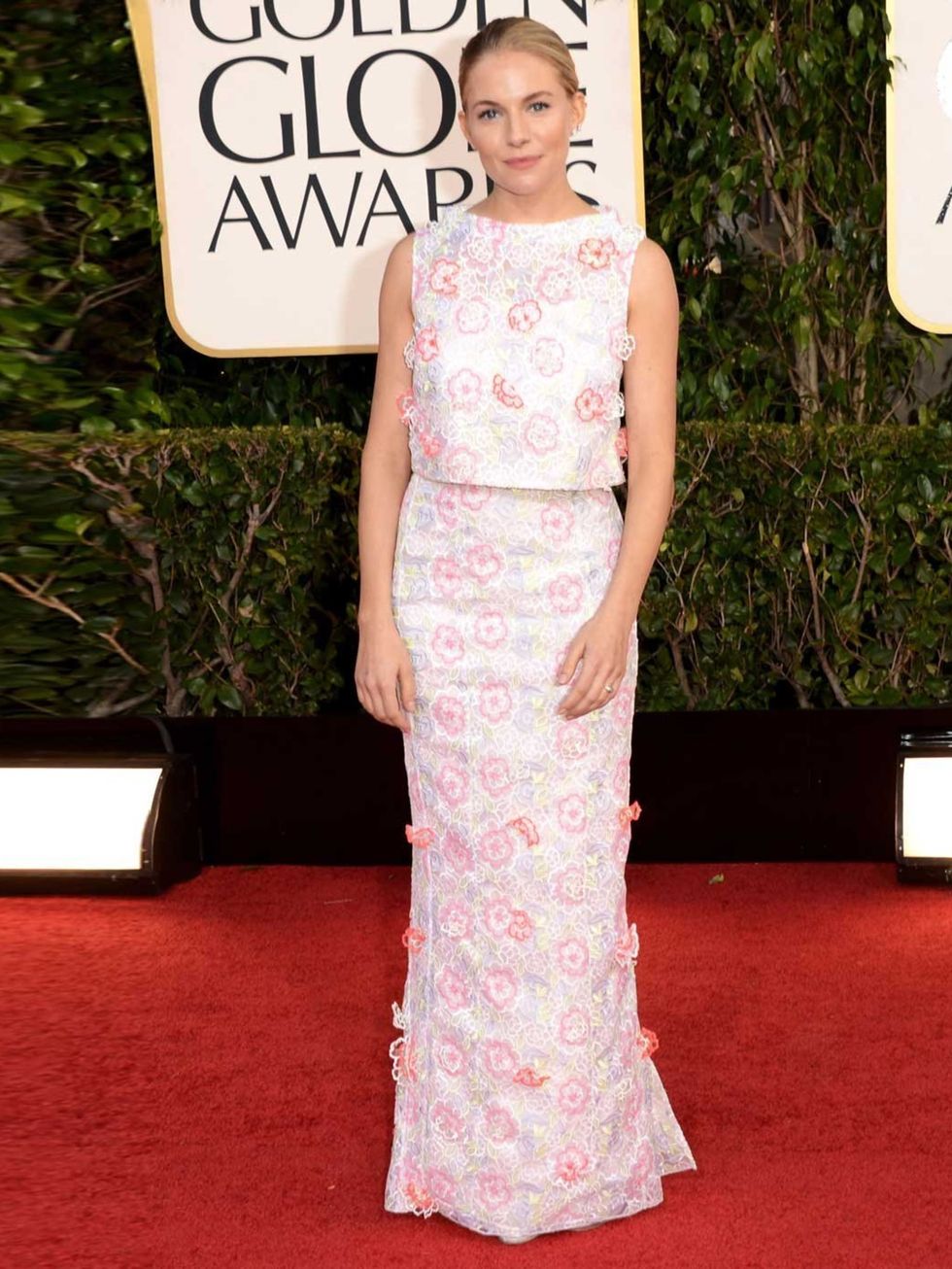 <p>Sienna Miller wore an Erdem dress and Giuseppe Zanotti heels at the Golden Globe Awards 2013.</p>