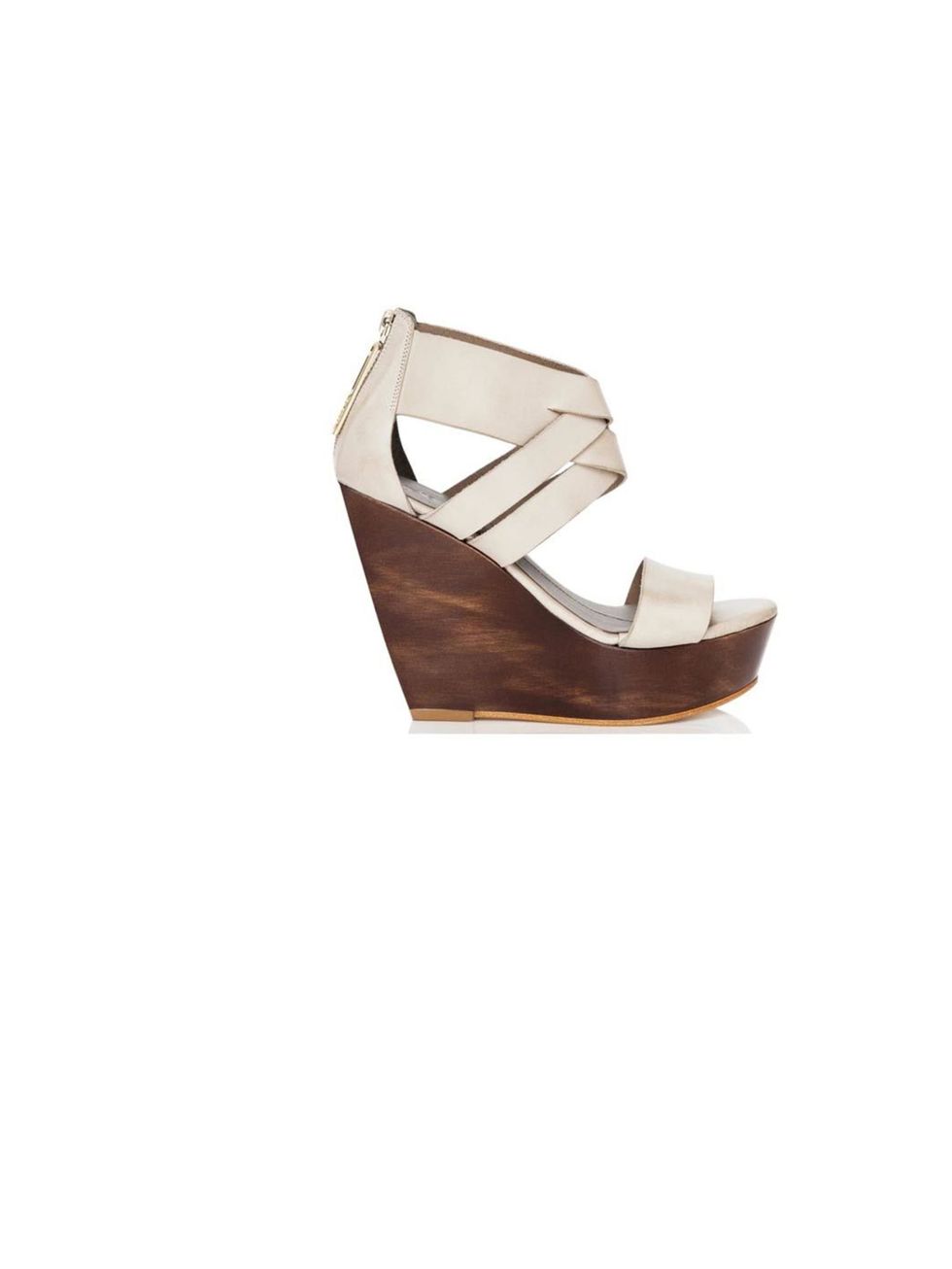 <p>Finsk chunky wedges, £380, at <a href="http://www.thebeachtomatoshack.com/store/view/finsk-cream-chunky-wooden-wedges/?Pid=291&amp;CategoryId=3">The Beach Tomato Shack</a></p>