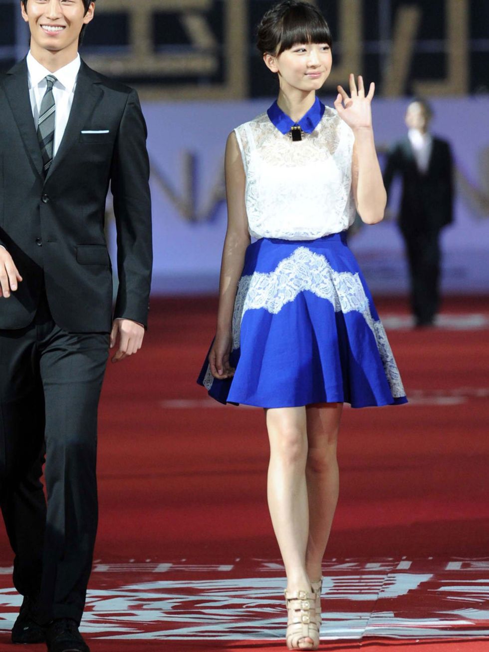 <p>Zhou Dongyu wearing a lace <a href="http://www.elleuk.com/catwalk/designer-a-z/carven/autumn-winter-2012">Carven</a> blouse and flippy skirt at the Beijing Film Festival Opening</p>