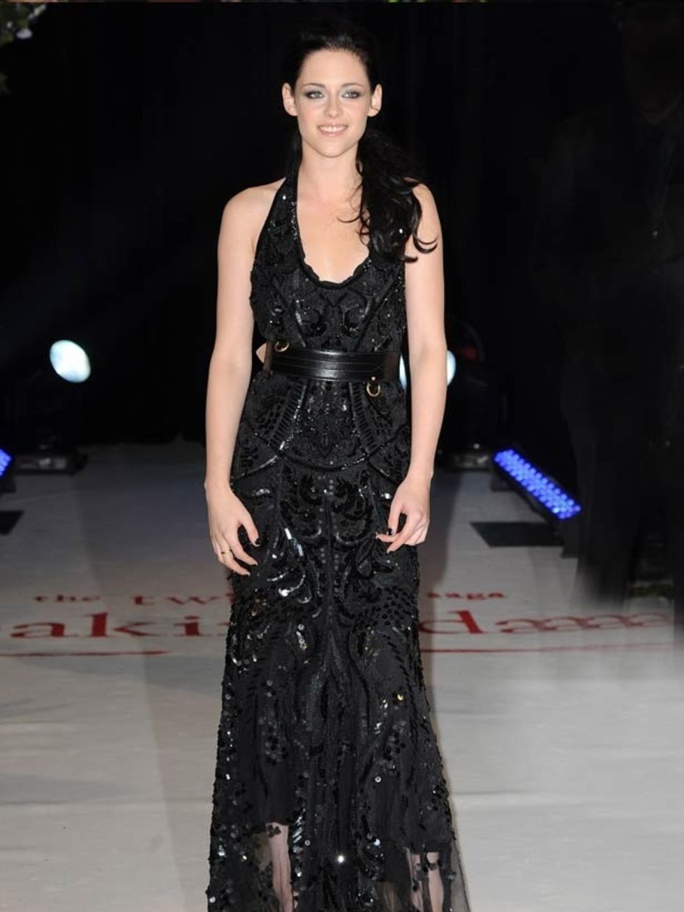 <p><a href="http://www.elleuk.com/starstyle/style-files/(section)/kristen-stewart">Kristen Stewart</a> wears a black lace <a href="http://www.elleuk.com/catwalk/collections/roberto-cavalli/">Roberto Cavalli</a> gown with an <a href="http://www.elleuk.com/