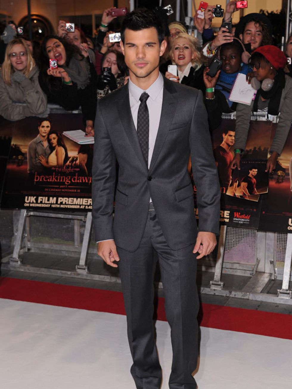 <p>Taylor Lautner wears a custom <a href="http://www.elleuk.com/catwalk/collections/emporio-armani/">Emporio Armani</a> suit to the London premiere of <em>Breaking Dawn Part I.</em></p>