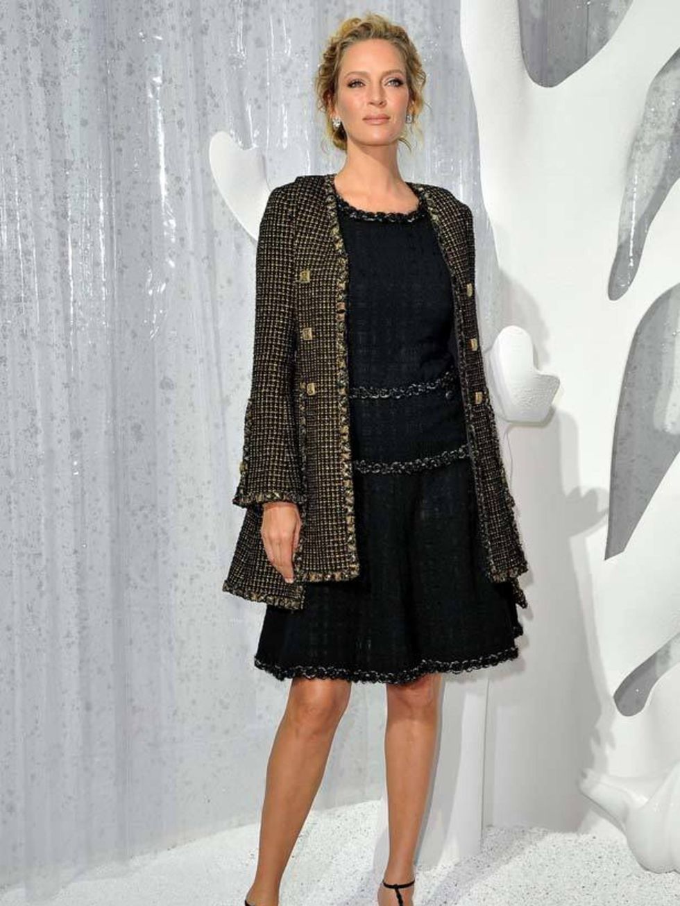 <p><a href="http://www.elleuk.com/content/search?SearchText=Uma+Thurman+&amp;SearchButton=Search">Uma Thurman</a> wearing a <a href="http://www.elleuk.com/catwalk/collections/chanel/couture-aw-2011">Chanel</a> jacket &amp; dress for the house's Spring/Sum