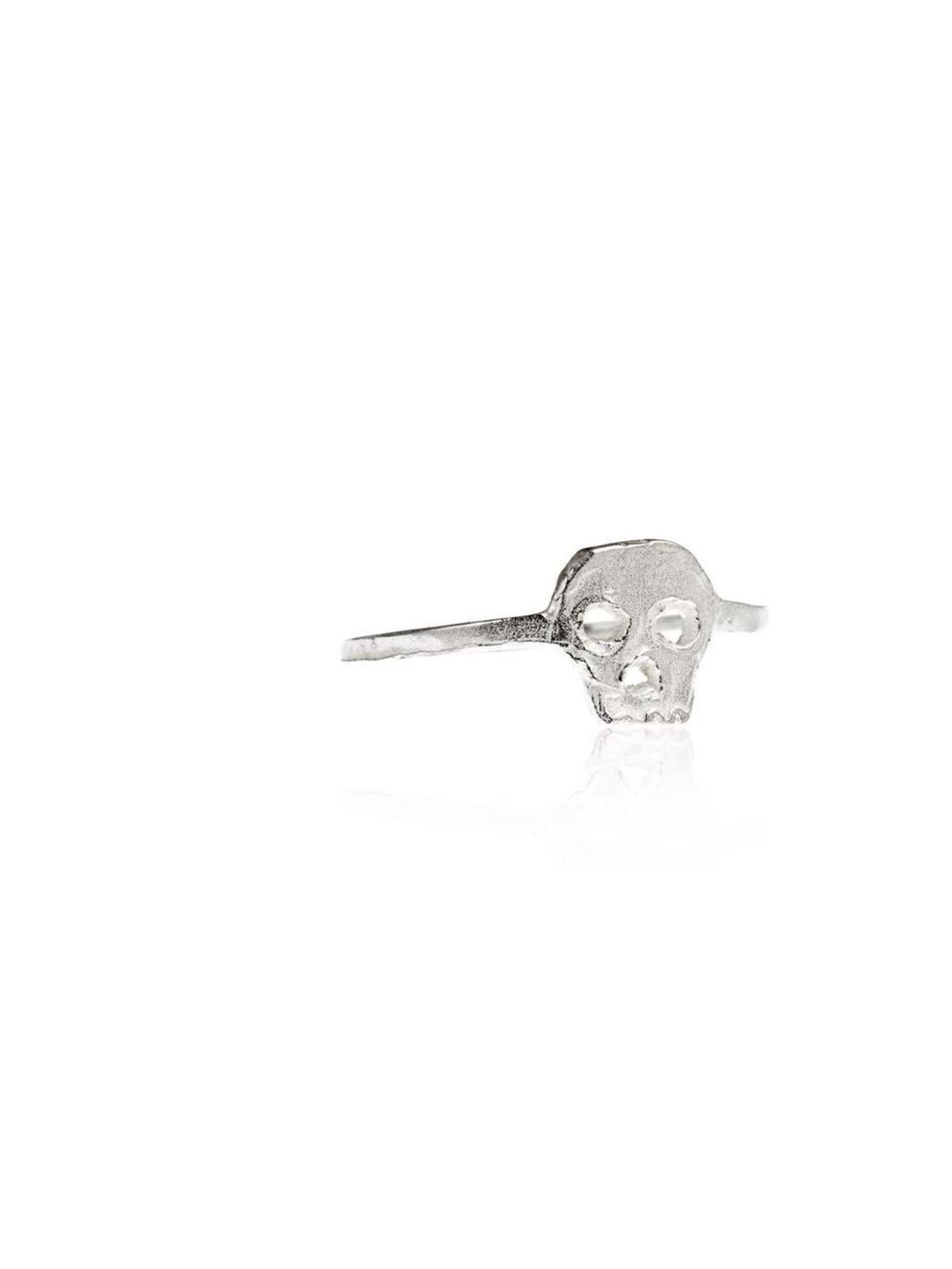 <p>We love the delicate execution of this rock'n'roll skull ring! Minimal silver jewellery will look more modern than gold against white shoes <a href="http://www.daisyknights.com/collections/kim/skull-ring/sterling-silver">Daisy Knights</a> sterling sil