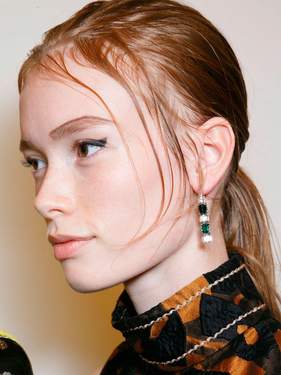 <p><a href="http://www.elleuk.com/catwalk/prada/spring-summer-2015">Prada </a></p>

<p>The look: Tough ponytail</p>

<p>Hair stylist: Guido</p>

<p>Key products: Redken Diamond Oil Spray (out Dec) and Mess Around 10 Cream-Paste, £11.16 at <a href="http://