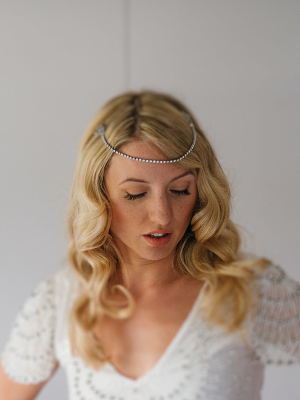<p>I had my headpiece made by <a href="https://www.etsy.com/uk/shop/AgnesHart" target="_blank">Agnes Hart</a>. We sourced original 1920's dress clips and Agnes Hart turned these into a forehead band.</p>