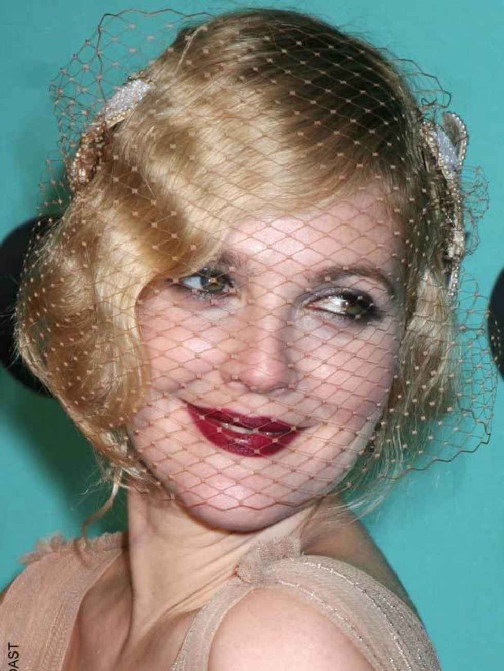 <p><a href="http://www.elleuk.com/news/Star-style-News/Drew-Barrymore-sends-us-head-over-heels-for-headpieces">See the other hair trend Drew loves</a></p>