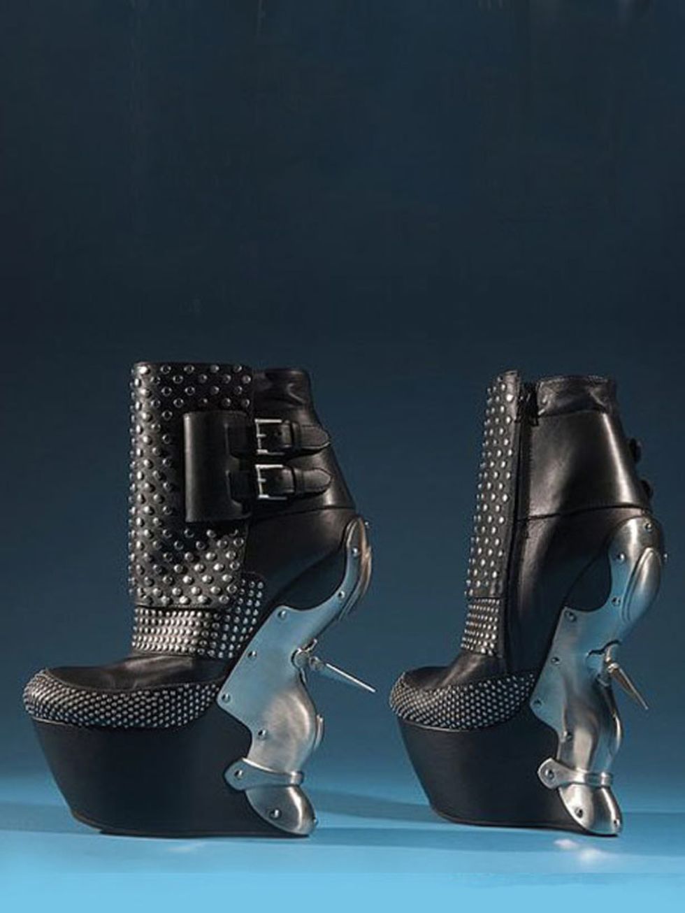 <p>Spike-heeled boots by Alexander McQueen</p>