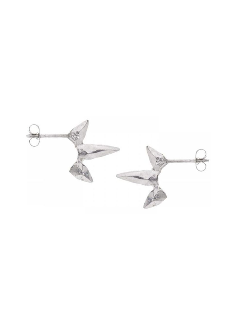 <p>Swap simple studs for modern spikes.</p><p><a href="http://www.daisyknights.com/products/Spike-Stud-Earrings%252d-Silver.html">Daisy Knights</a> earrings, £84</p>