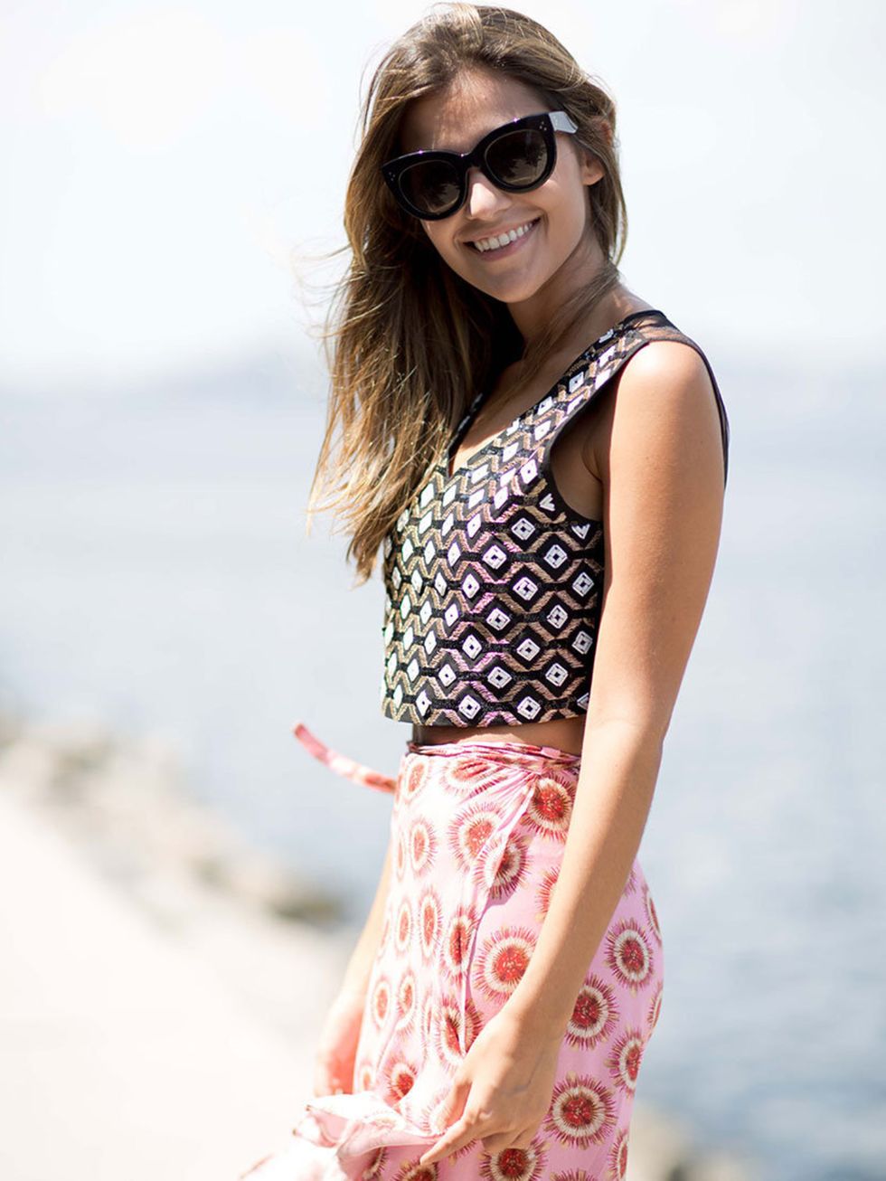 <p>Mirilla Mambo wears Pinko top and Andriana Degreas skirt, Céline sunglasses.</p>