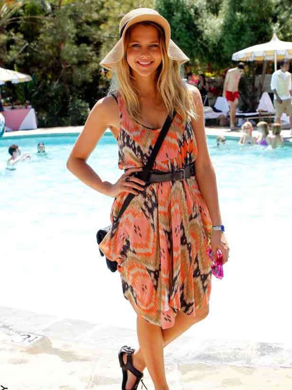 <p>Teresa Palmer teams her printed All Saints dress with a <a href="http://www.elleuk.com/catwalk/collections/mulberry/autumn-winter-2011/review">Mulberry</a> bag at the Coachella BBQ party thrown by Mulberry in Palm Springs, 16 April, 2011</p>
