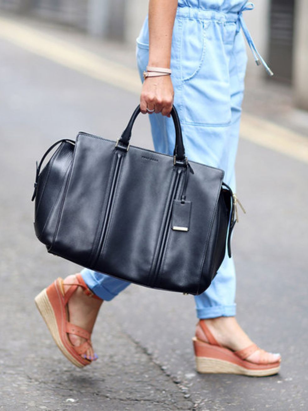Kirsty Dale wears black leather bag by Hugo Boss, &pound;800