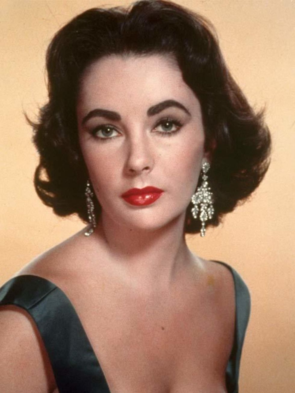 <p> </p><p><a href="http://www.elleuk.com/fashion/special-features/bridal-icons">Elizabeth Taylor</a> pictured here in 1957 was known for her penchant for diamonds</p>