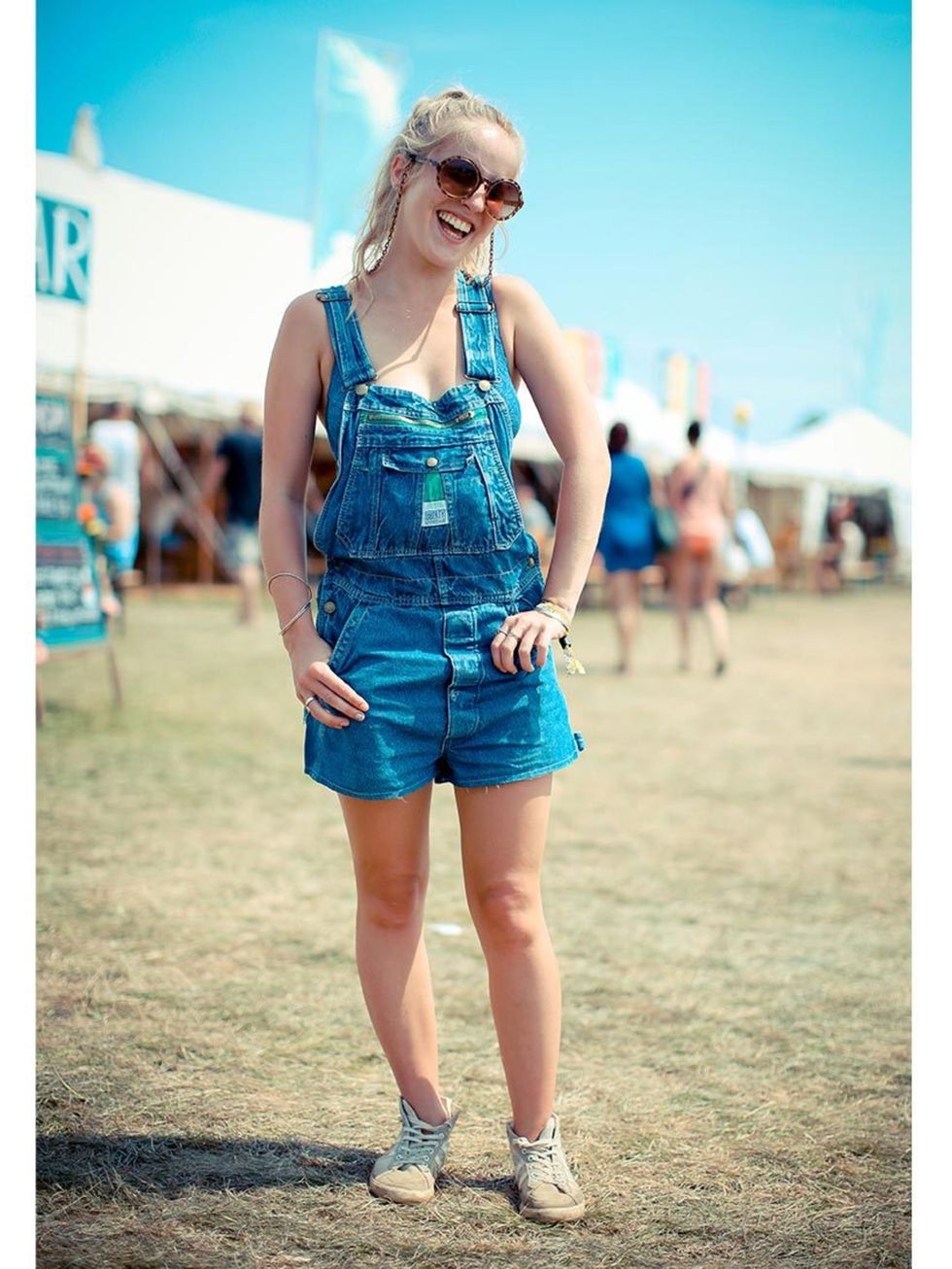 Sophie wears Liberty dungarees, Gola trainers, ASOS sunglasses.