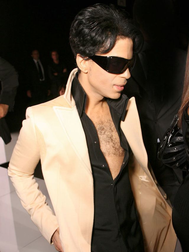 <p>Prince arriving at a Versace show in 2007</p>